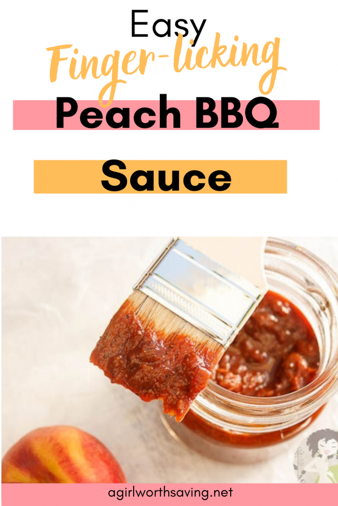 peach bbq sauce in a jar with a brush on the top of it