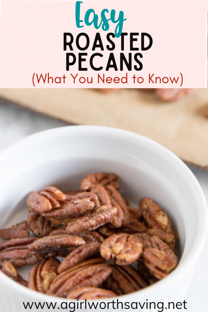 roasted pecans in a white dish