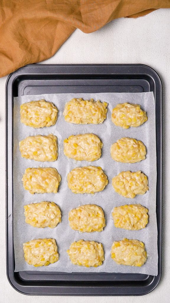 Corn nuggets lined on a tray ready to go into the freezer
