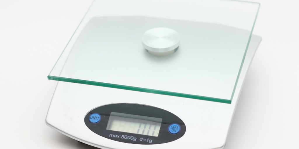food scale to measure grams which you can convert to ounces 