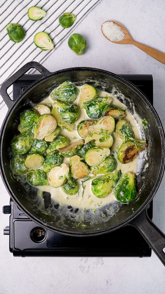 Skilled filled with Brussels sprouts and heavy whipping cream 