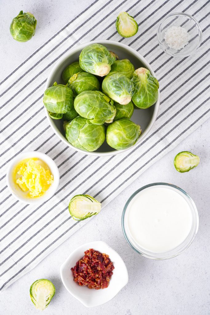 Ingredients to make creamed Brussel sprouts with bacon 