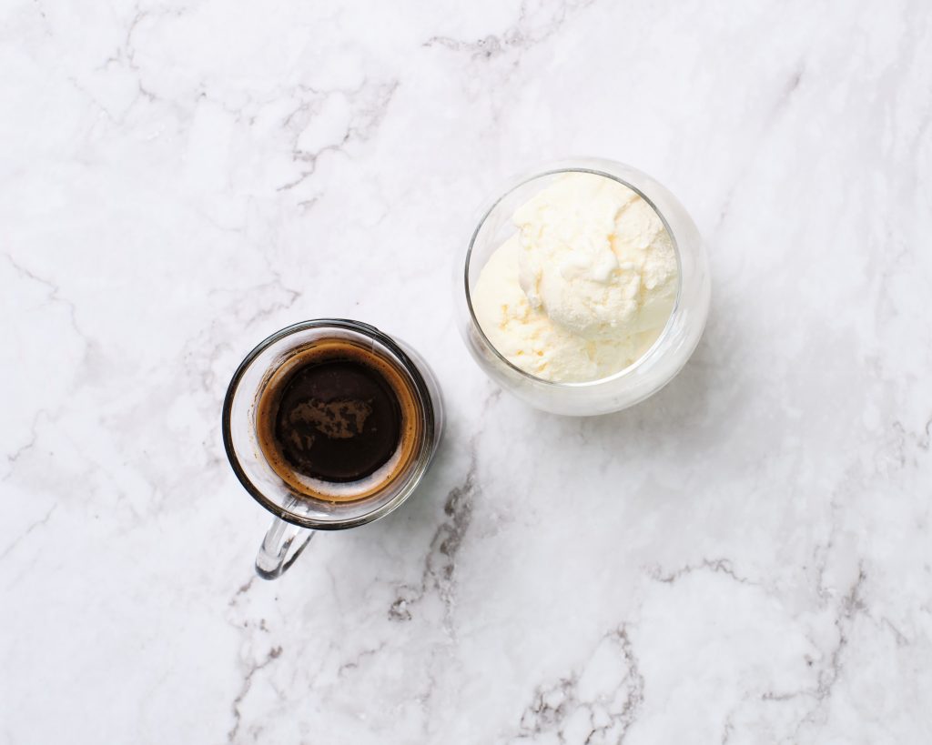 vanilla ice cream next to shot of espresso