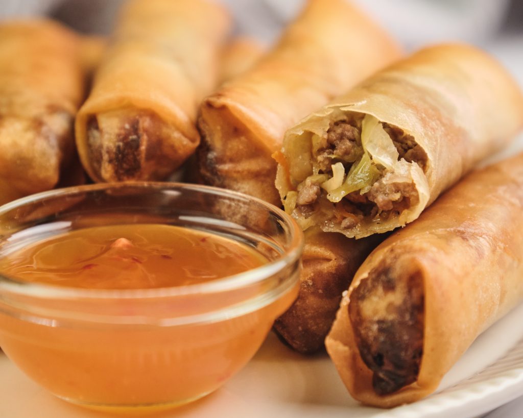 close up of lumpia recipe with the filling showing 