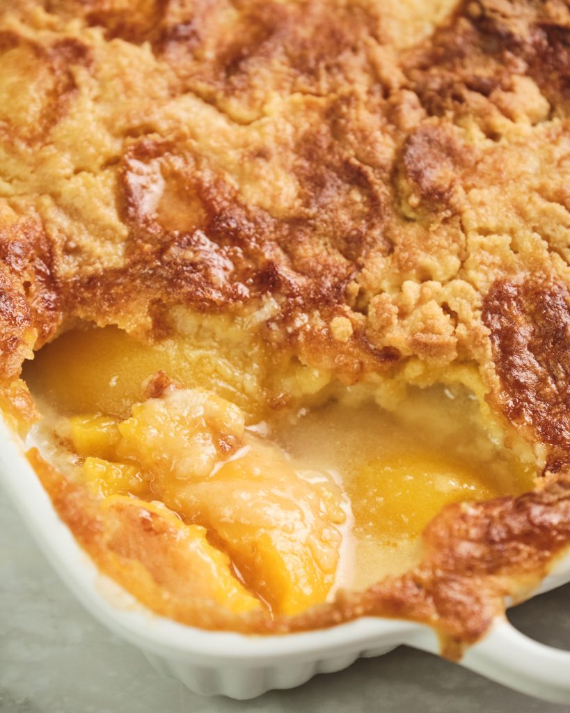 Close up of peach cobbler with cake mix