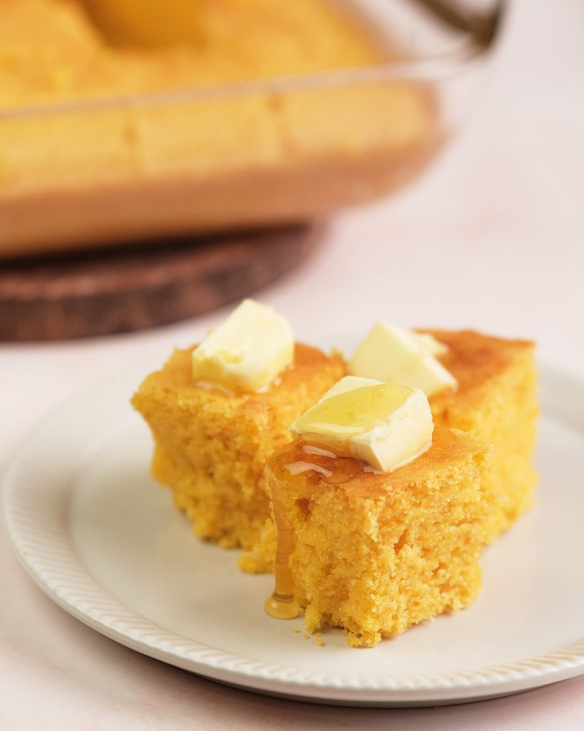 gluten free cornbread with butter and honey on top 
