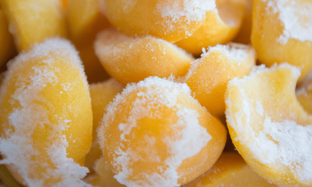 close up of frozen peach halves