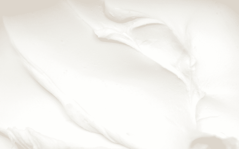 Close-up texture of creamy cream cheese.
