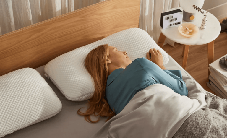 Woman lying on bed pillow