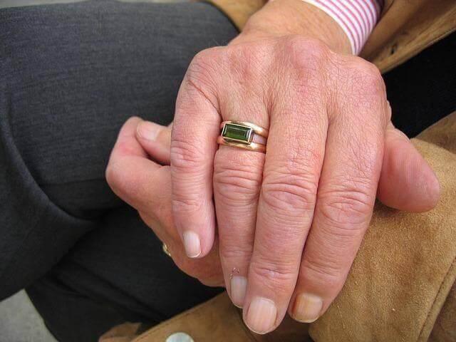 Close-up of a hand wearing a ring,