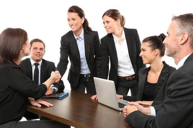 How to Reduce Administrative Errors When Updating Employee Pay Kelly Bejelly Business team discussing employee pay updates and reducing errors.
