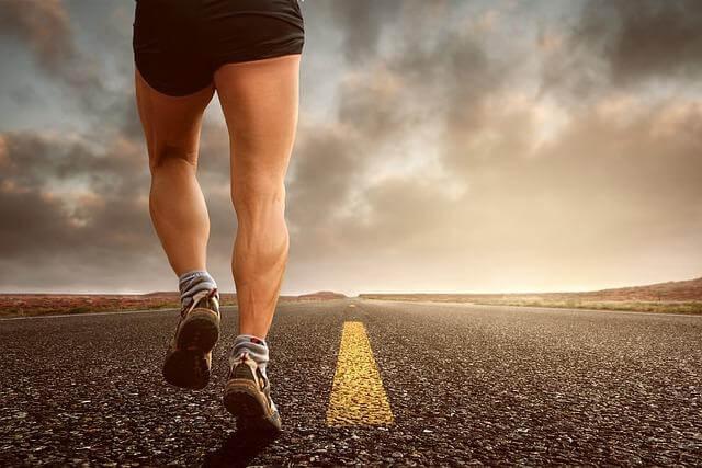 Man jogging outdoors safely after cosmetic procedures