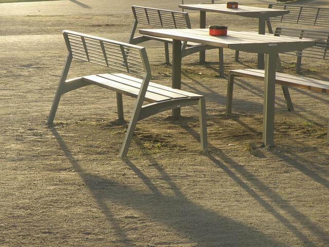 Outdoor benches arranged on a field