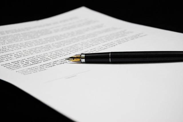 Pen and paper for Canadian immigration application