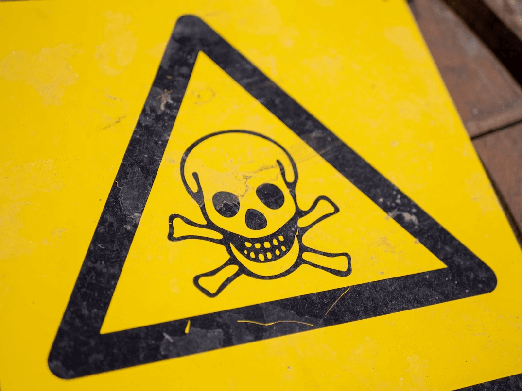 Warning sign with skull and crossbones
