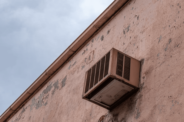 Air conditioner unit on a building exterior