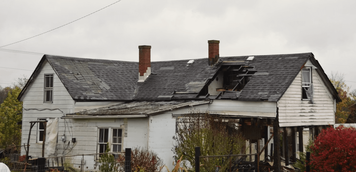 Easy Roof Checks That Help You Avoid Bigger Bills Kelly Bejelly Dilapidated house with a severely damaged roof