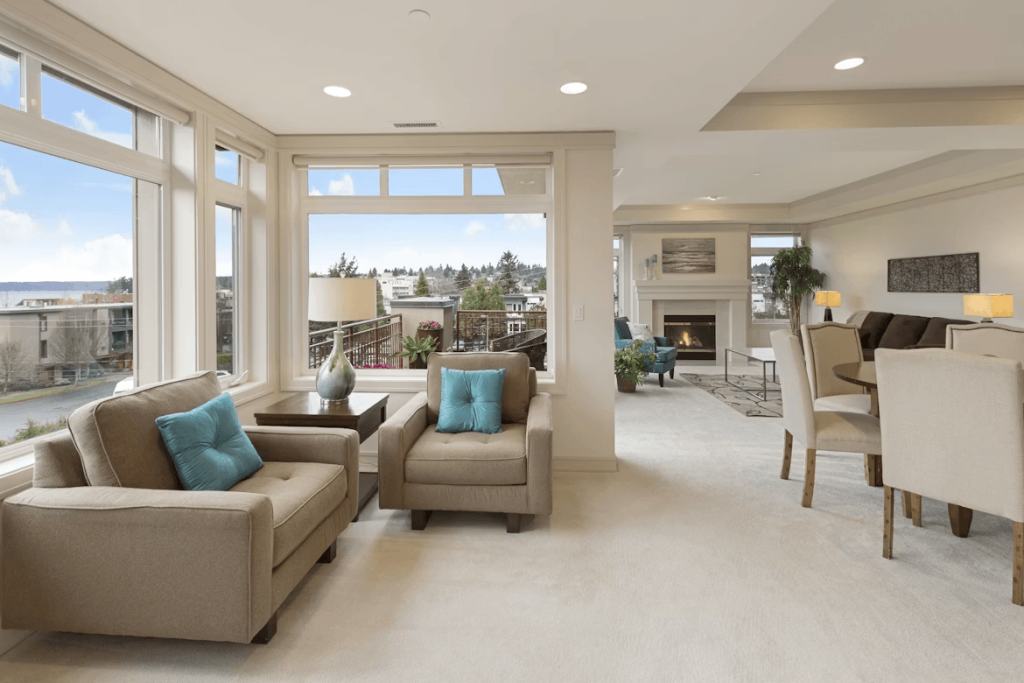 Large living room with fireplace and furniture