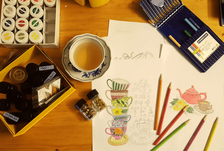 6 Signs It's Time to Pick Up a New Hobby Kelly Bejelly A wooden table filled with various crafting