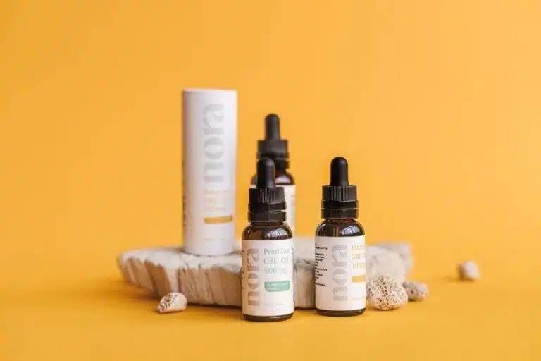 Three CBD product bottles