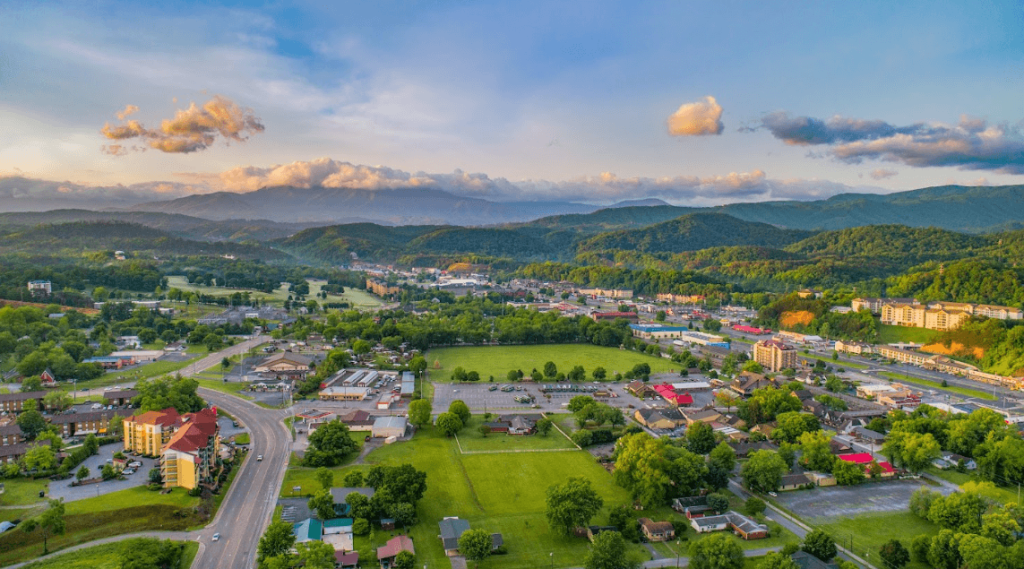 Aerial view of a town nestled among mountains