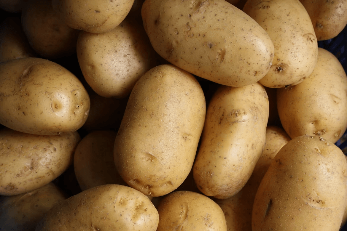 How to Pick the Best Potato for Every Type of Meal Kelly Bejelly A pile of potatoes for different meal types
