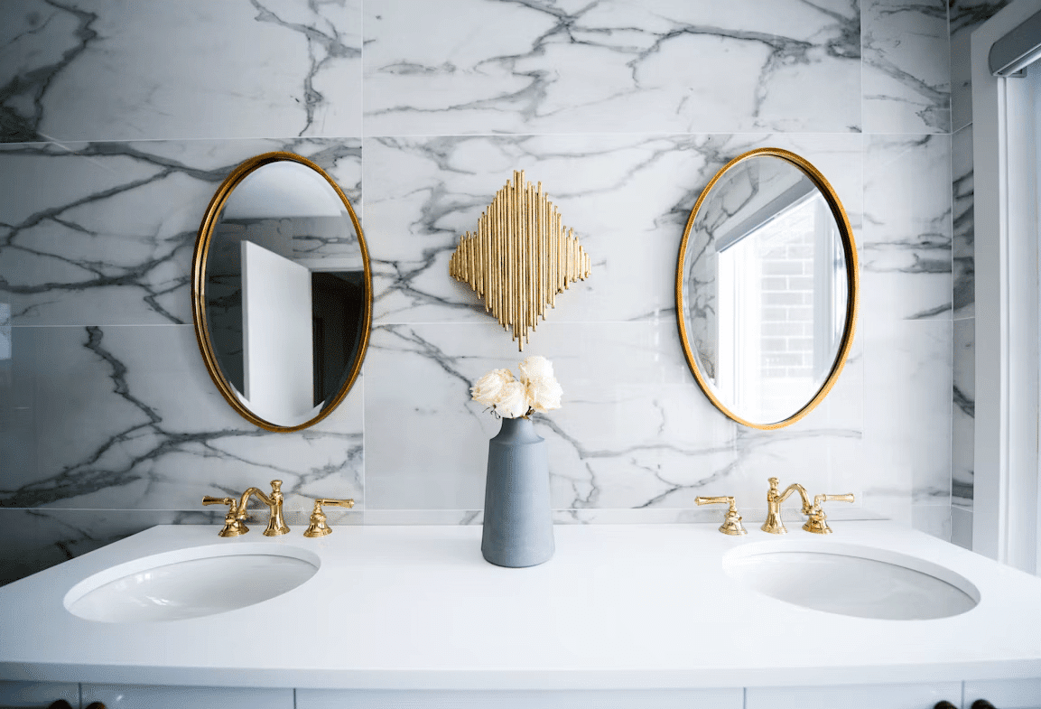 Bathroom with two sinks and two mirrors