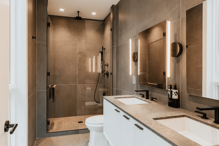 Modern bathroom with double sinks and shower