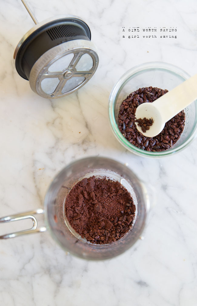 ground cacao in a French press to make cacoa coffee