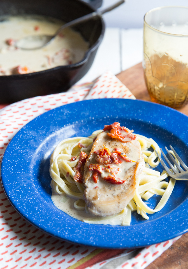 Looking for a tasty creamy paleo chicken recipe? This dairy-free cream sauce is silky perfection and works wonderfully with the tart sun dried tomatoes. Spoon over grilled chicken for the perfect healthy lunch or dinner.