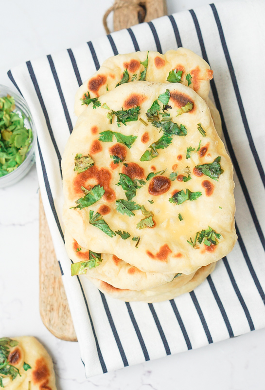 Cook this easy einkorn naan recipe in your cast iron pan and you'll get pillowy soft bread. Perfect with your favorite curry or you can use it as pita bread!