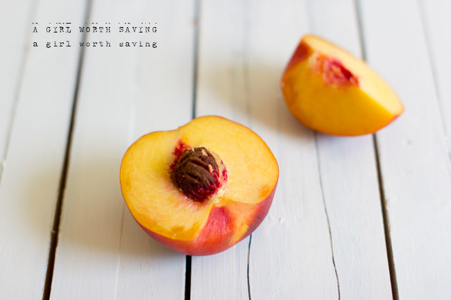 Fresh peaches sliced on a tabletop for this peach smoothie recipe 