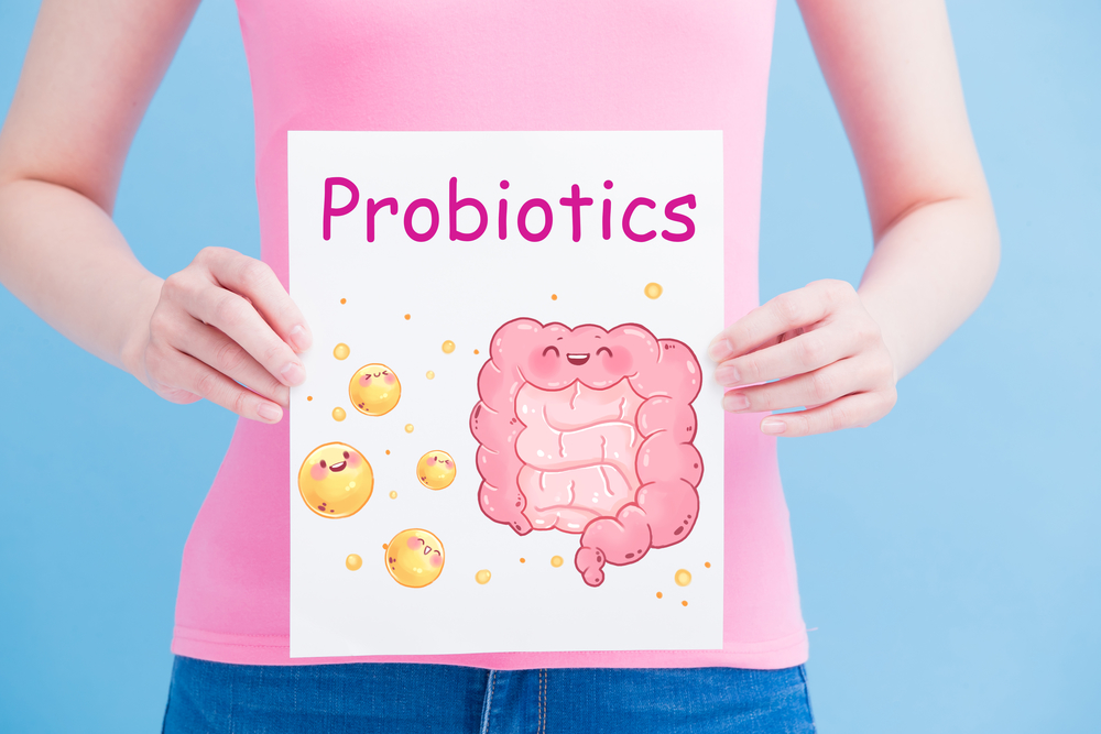 woman take probiotics 